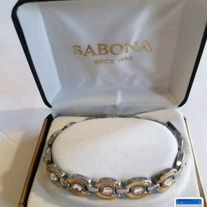 E12 Sabona ladies gold horseshoe  mag. bracelet